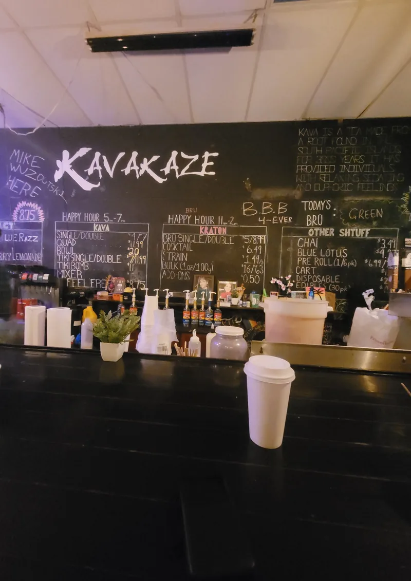 The chalkboard wall behind the bar, the Kavakaze lettering painted above the hand-written boards.